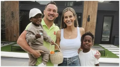 UFC fighter Michael Chandler says he's raising his two Black adopted sons not to see race or color.