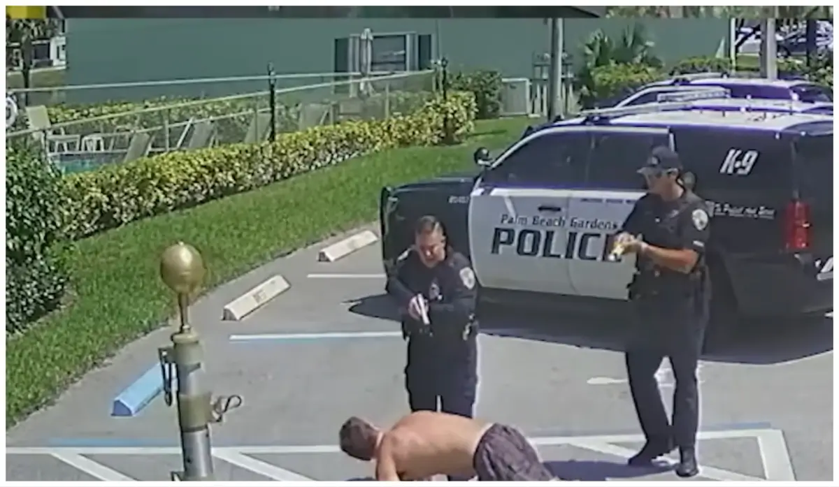 'Why I Am In Handcuffs?' Video Shows ‘Furious' Florida Cop Pull Gun