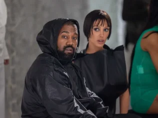 MILAN, ITALY - FEBRUARY 23: Kanye West and Bianca Censori attends the Marni fashion show during the Milan Fashion Week Womenswear Fall/Winter 2024-2025 on February 23, 2024 in Milan, Italy. (Photo by Arnold Jerocki/Getty Images)