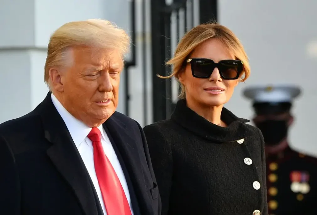 US President Donald Trump and First Lady Melania Trump make their way to board Marine One as they depart the White House in Washington, DC, on January 20, 2021. - President Trump travels to his Mar-a-Lago golf club residence in Palm Beach, Florida, and will not attend the inauguration for President-elect Joe Biden. (Photo by MANDEL NGAN / AFP) (Photo by MANDEL NGAN/AFP via Getty Images)
