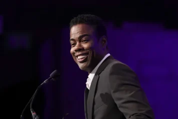 NEW YORK, NEW YORK - MARCH 15: Chris Rock speaks onstage at the National Board of Review annual awards gala at Cipriani 42nd Street on March 15, 2022 in New York City. (Photo by Jamie McCarthy/Getty Images for National Board of Review)