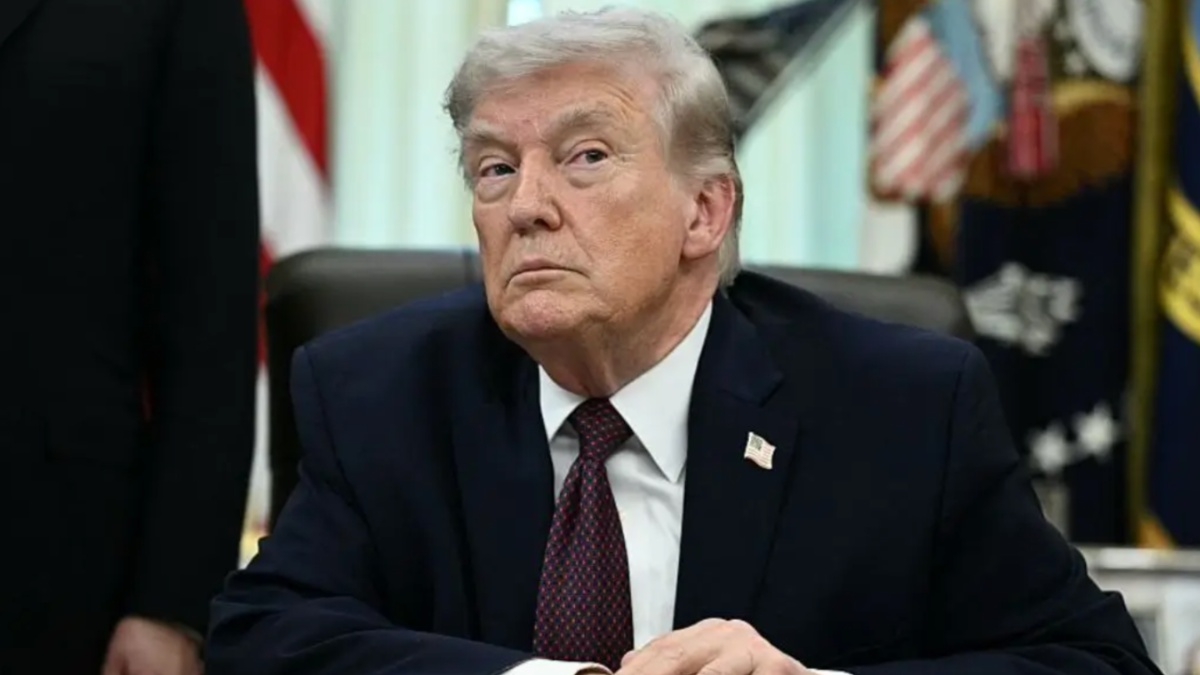 ‘Camera Guy Was Wrong’: Trump Flustered Trying to Push Through Awkward Question, but the Distracting Man Beside Him Had Everyone Asking the Same Thing