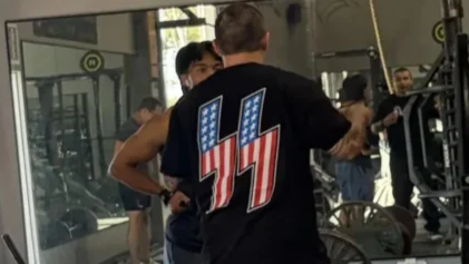 A California gym owner was caught wearing a shirt with Nazi propaganda on it.