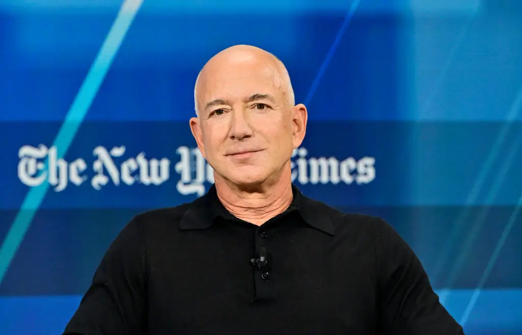 NEW YORK, NEW YORK - DECEMBER 04: Jeff Bezos speaks onstage during The New York Times Dealbook Summit 2024 at Jazz at Lincoln Center on December 04, 2024 in New York City. (Photo by Eugene Gologursky/Getty Images for The New York Times)
