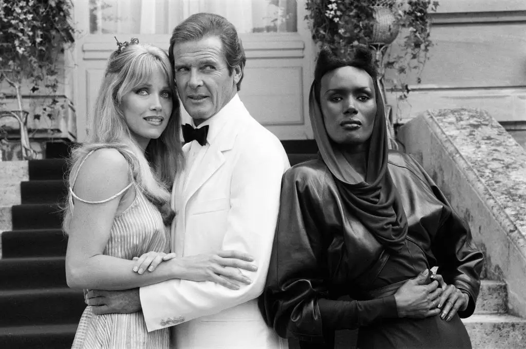 A View to a Kill 1984 James Bond film, Photocall outside The Chateau de Chantilly in France, Thursday 16th August 1984, Tanya Roberts as Stacey Sutton, Roger Moore as James Bond, MI6 agent 007 and Grace Jones as May Day. (Photo by Kent Gavin/Mirrorpix via Getty Images)
