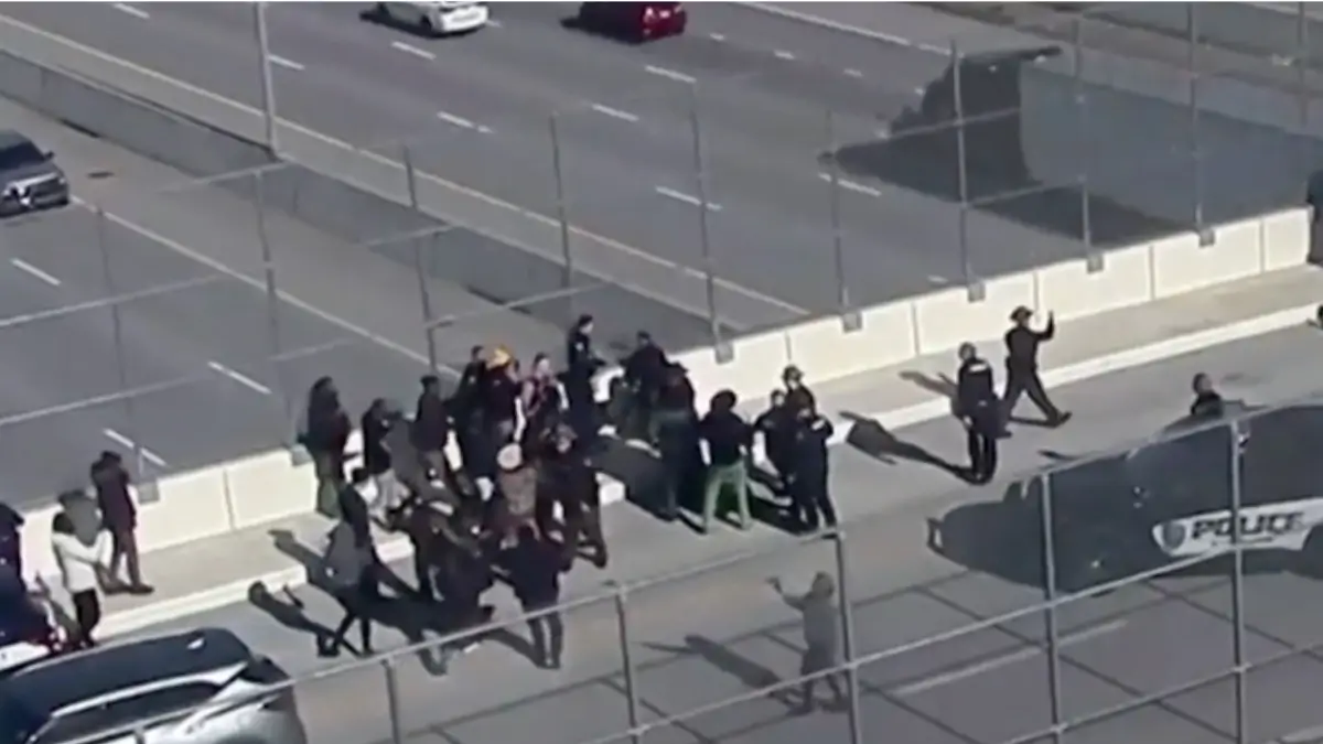 White Supremacists Group Forced to Retreat from Highway Overpass