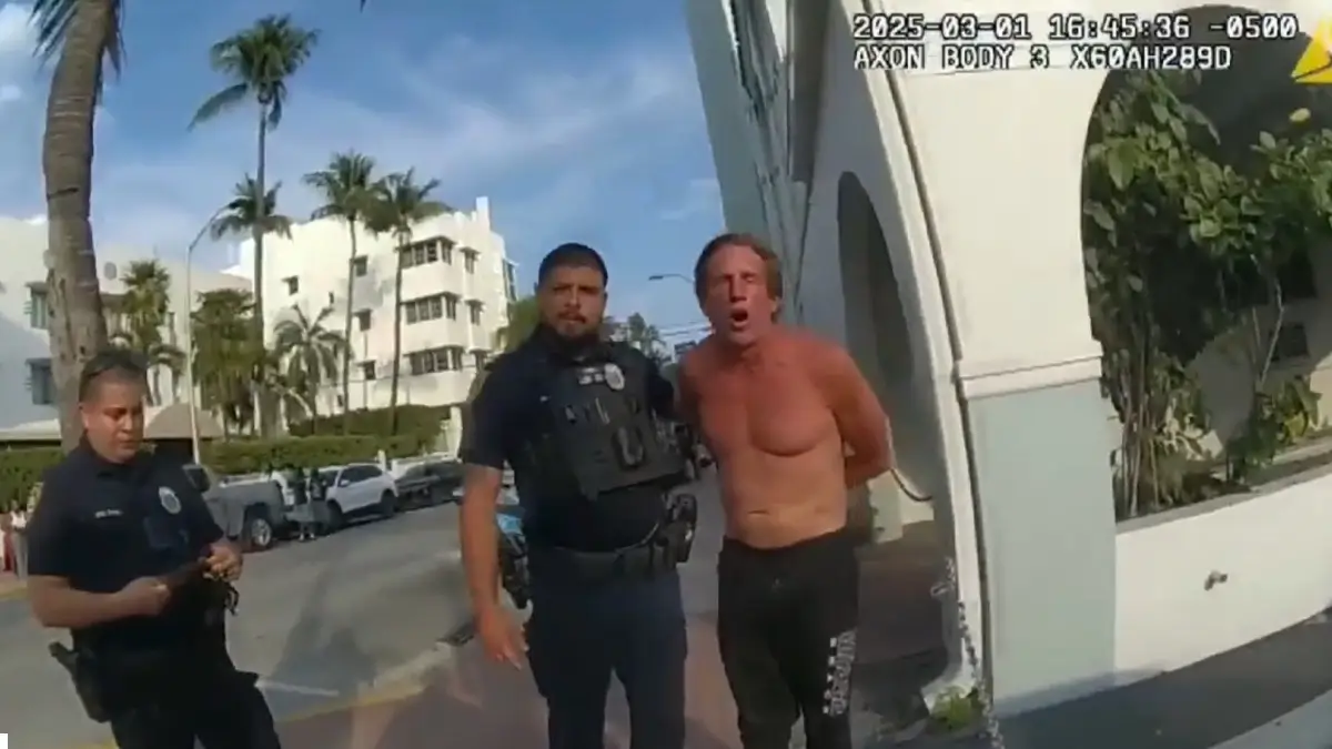 Video Shows Dramatic Takedown of Ax-Wielding Man Accused of Chasing Woman While Shouting the N-Word In Miami Beach