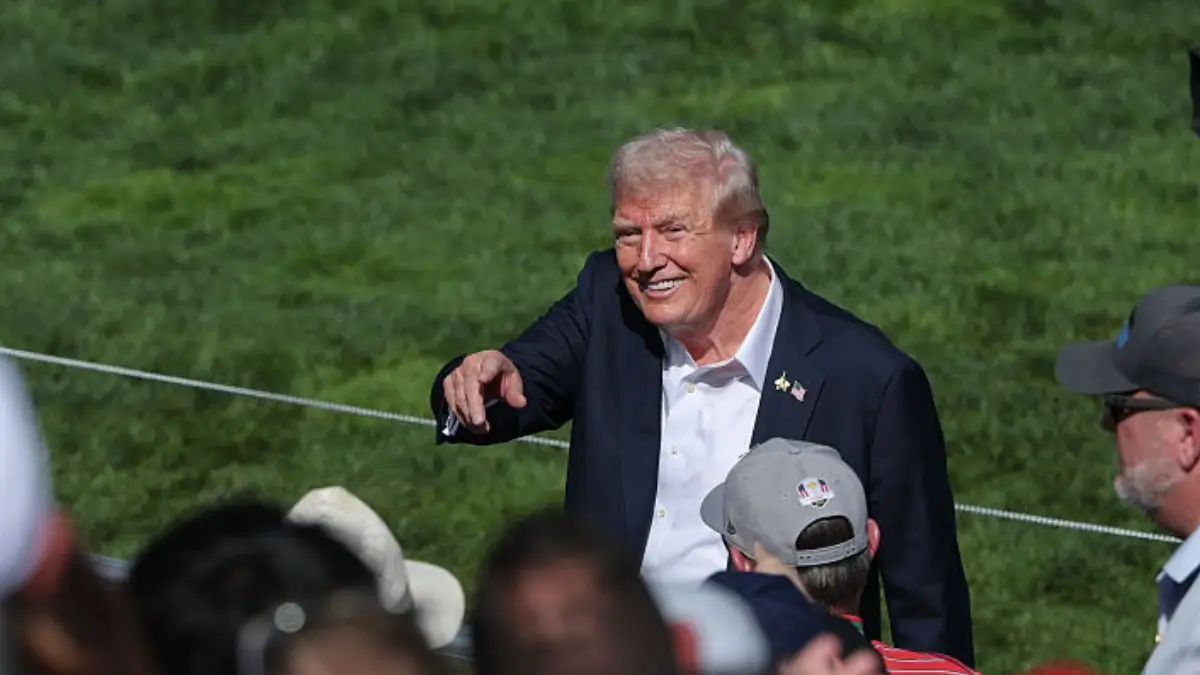 ‘Look at Her’: Trump Jerks Golf Cart to a Stop for Eager Fan, Nearly Sending His Grandson Airborne — Then Cameras Zoom In and Catch a Chilling Detail