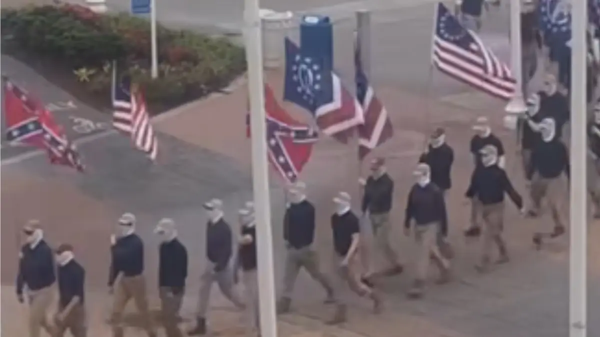‘Traded the Pointed Caps for Baseball Caps’: Masked White Supremacist Group Patriot Front Marches Through Virginia Beach Oceanfront, Sparking First Amendment Debate