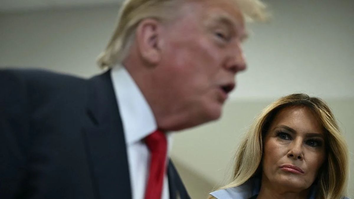 Trump's claim he helps men save their marriages takes on irony after he awkwardly flirts with crowd member